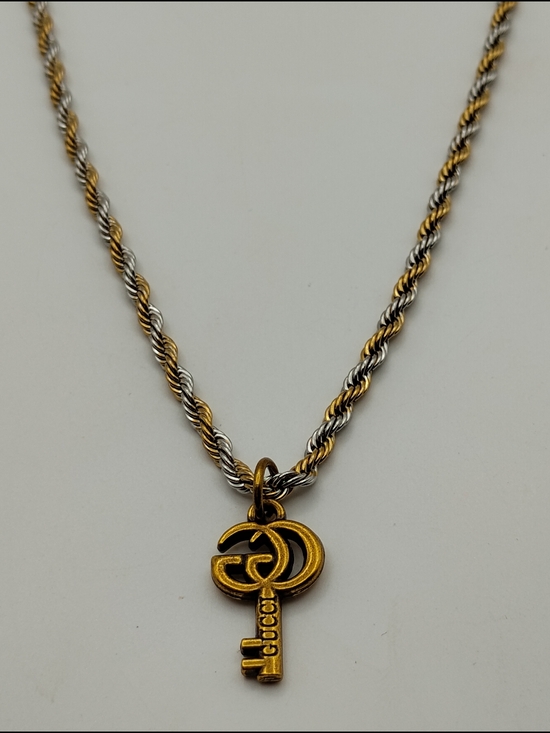 Gucci Jewelry - Gucci Gold-Tone Key Pendant On A Gold & Silver Rope Stainless Steel Necklace